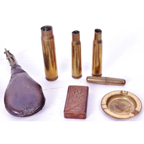 253 - A collection of assorted militaria to include; WWI First World War medal awarded to one 31767 Pte G ... 