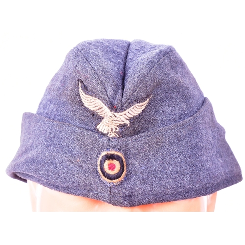 265 - A WWII Second World War Third Reich Nazi German Luftwaffe forage cap, Air Signals patches and photo ... 