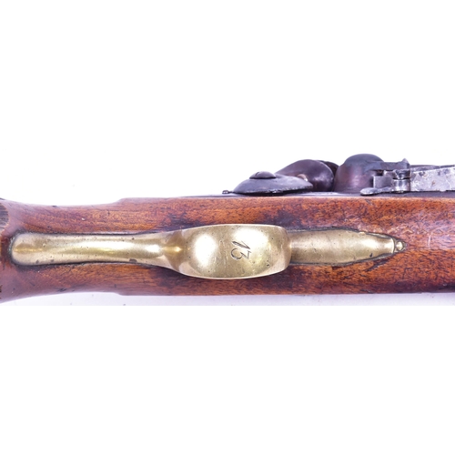 27 - An 18th Century Durs Egg of London made flintlock pistol. Brass mounted walnut stock with an oval lo... 