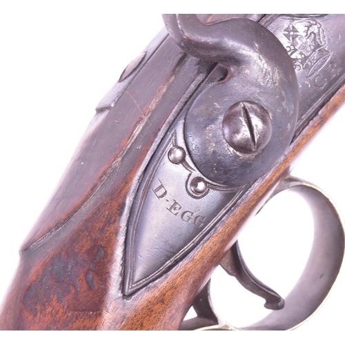 27 - An 18th Century Durs Egg of London made flintlock pistol. Brass mounted walnut stock with an oval lo... 