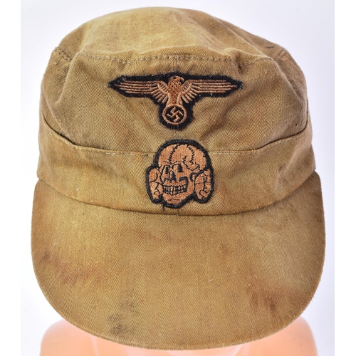 277 - A WWII Second World War Third Reich Nazi German Waffen SS forage cap. Khaki with an applied skull an... 