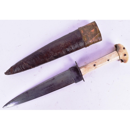 287 - A 19th Century Persian / Afghan style Kard or Choora knife with a two piece bone grip surrounding th... 