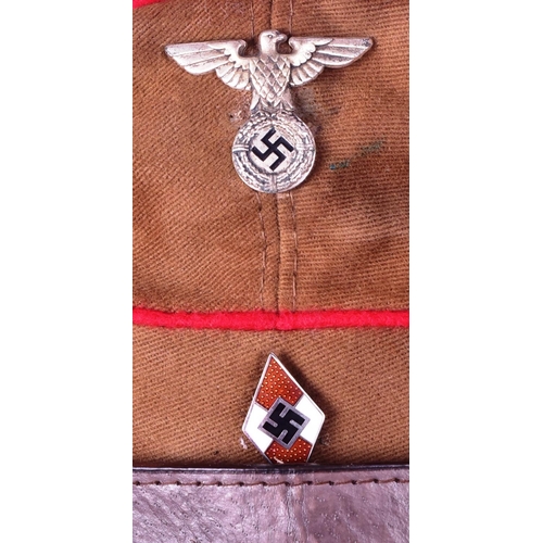 295 - A WWII Second World War Third Reich Nazi German Hitler Youth Motor Service Branch visor cap. Tan col... 