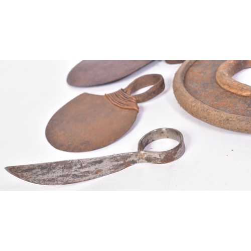 296 - A collection of East African Turkana / Karamojong People tribal wrist and finger knives. The wrist k... 