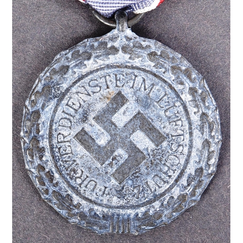 298 - A WWII Second World War Third Reich Nazi German RLB Luftshutz / Air Raid Protection medal 1938 and a... 