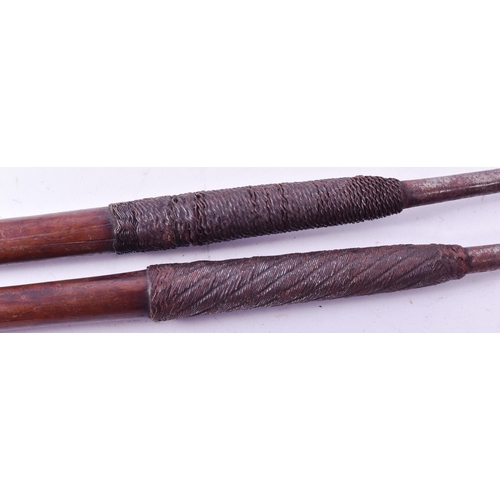 302 - A pair of South African Zulu Assegai / Spears. Leaf shaped tips with a metal shaft, wire banding and... 