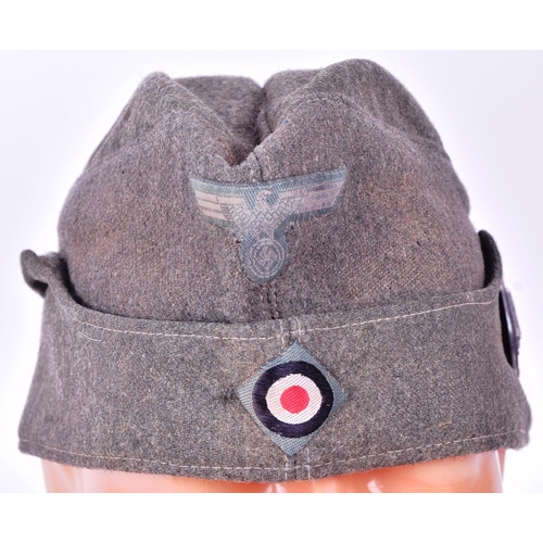 310 - A WWII Second World War Third Reich Nazi German Army soldiers M43 overseas side cap with marksman ba... 