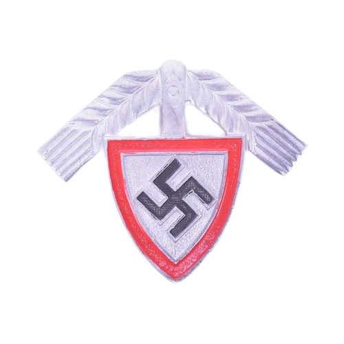 322 - A WWII Second World War Third Reich Nazi German RAD Labour Corps cap badge depicting a Swastika betw... 