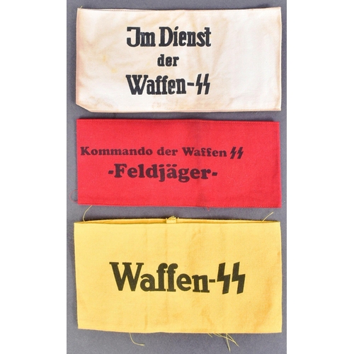 324 - A collection of x3 WWII Second World War style Third Reich Nazi German SS interest armbands comprisi... 