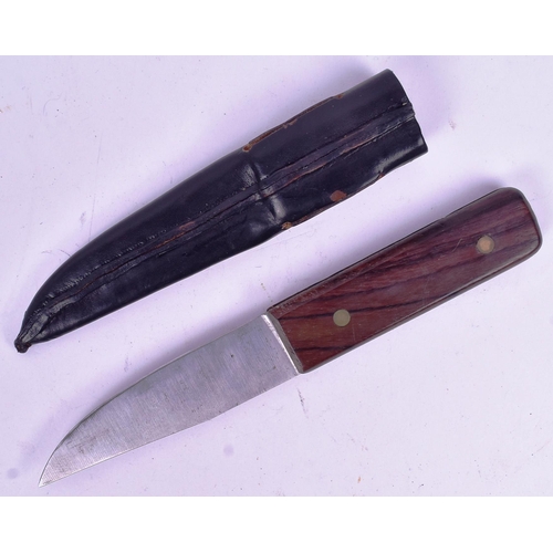 326 - A vintage Sheffield made RAF Royal Air survival knife. Wooden grip with finger grooves and a clipped... 