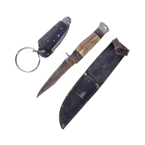 328 - A WWI First World War British Military jack knife and a bone handled boot knife. The jack knife with... 