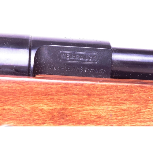 340 - An original German Weihrauch made .22 calibre under-lever air rifle model No. HW97K. Chequered semi-... 