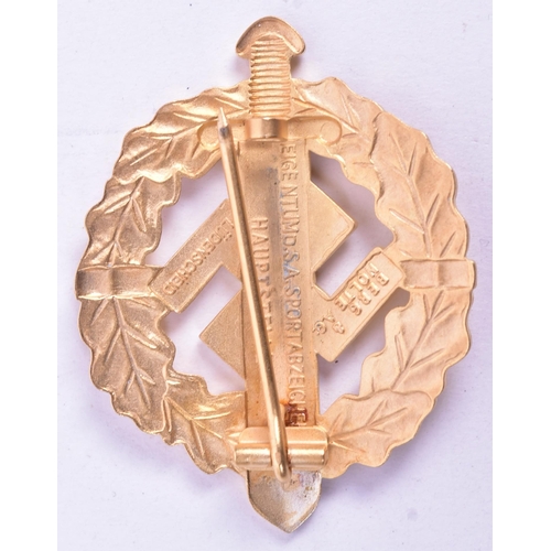 362 - A WWII Second World War Third Reich Nazi German SA Sports Badge. A gold colour7 example depicting a ... 