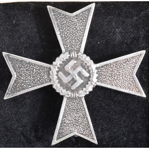 374 - A WWII Second World War Third Reich Nazi German 1st Class War Merit Cross. A non-military example wi... 