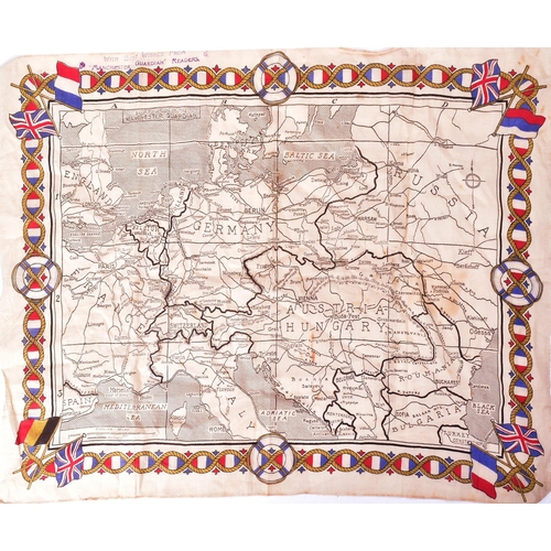 377 - A WWI First World War period Manchester Guardian Readers cloth map of Europe along with a brass Batt... 