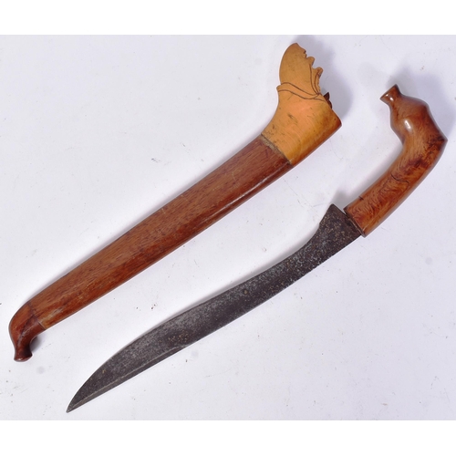 A vintage Indonesian / Malaysian Golok machete. Hooked pommel, curved ...