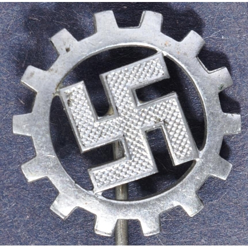 382 - A WWII Second World War Third Reich Nazi German DAF ( Labour Front ) pin badge. The cogwheel Swastik... 