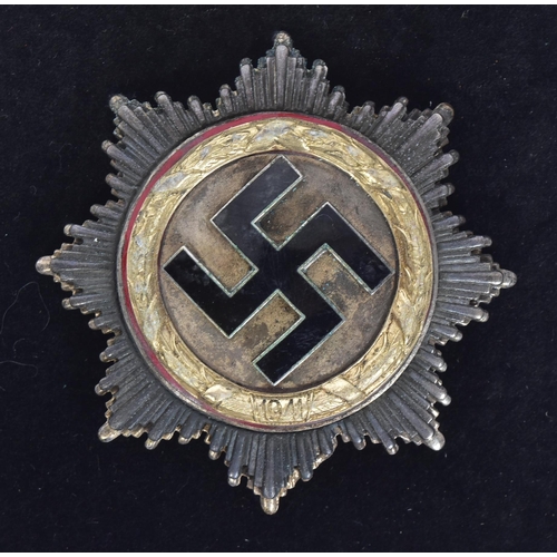 387 - A replica WWII Second World War Third Reich Nazi German ' Deutsches Kruez ' ( The German Cross ) med... 