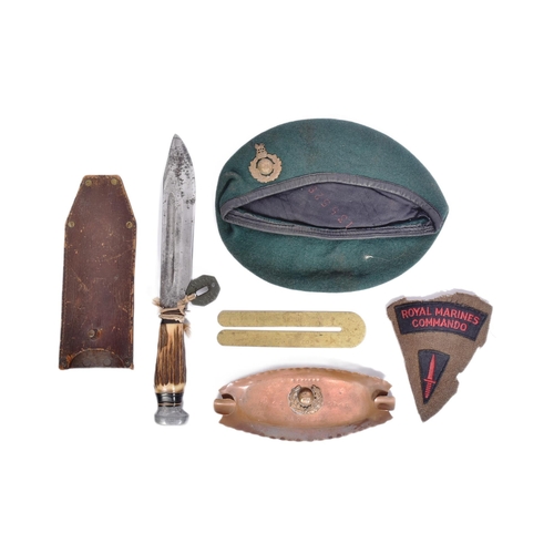 390 - A collection of WWII Second World War British RM Royal Marines items comprising a beret, tunic shoul... 