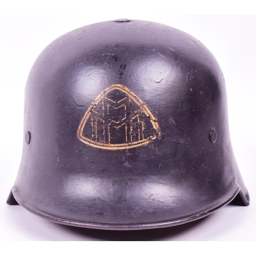 391 - A WWII Second World War Third Reich Nazi German factory workers fire helmet. Black with two sets of ... 