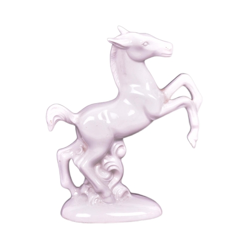 398 - A vintage circa 1950s East German Wagner & Apel made white porcelain figurine of a horse. Such item ... 