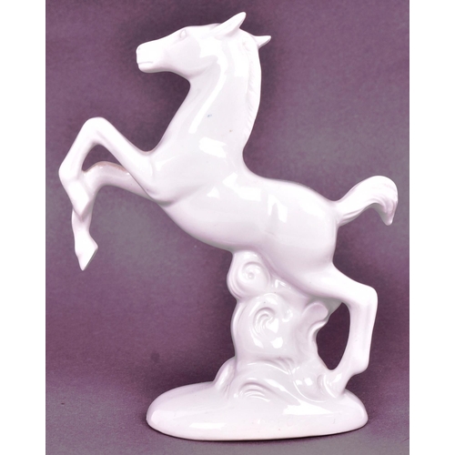 398 - A vintage circa 1950s East German Wagner & Apel made white porcelain figurine of a horse. Such item ... 