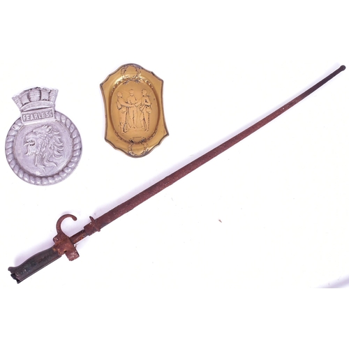 403 - A collection of assorted Military weapons and other pieces comprising a 19th Century Lebel rifle bay... 