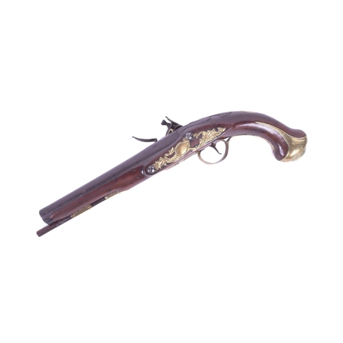 42 - An 18th Century Ketland of Birmingham made flintlock pistol. Rounded wooden butt with engraved brass... 