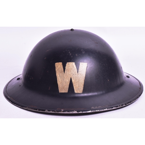 429 - Two WWII Second World War British steel combat Brodie helmets. One painted with a white ' W ' for wa... 