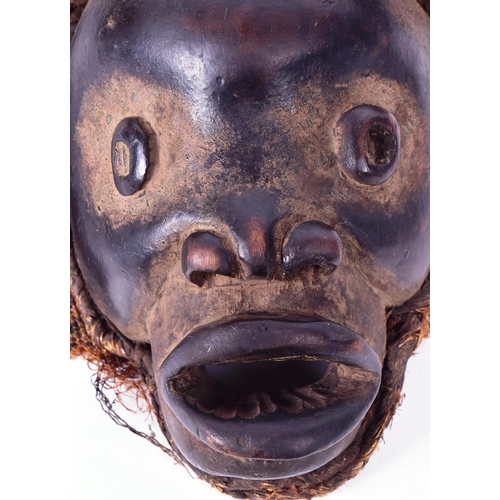 43 - A 20th Century vintage African DRC Demographic Republic of the Congo tribal Pende mask. Wooden const... 