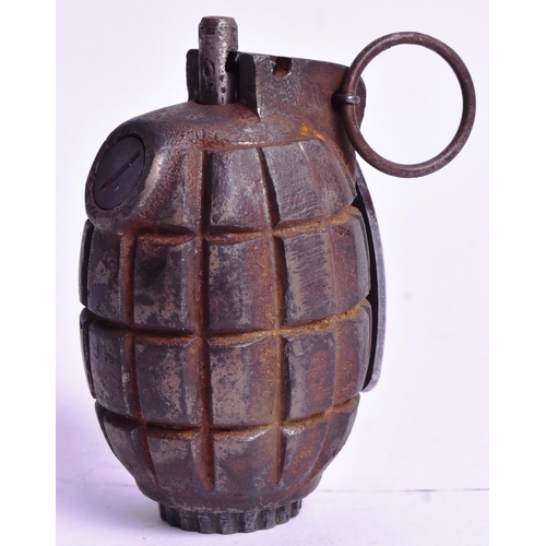 44 - An original WWII Second World War British Army issue No. 36 Mills Bomb hand grenade. Inert, but a co... 