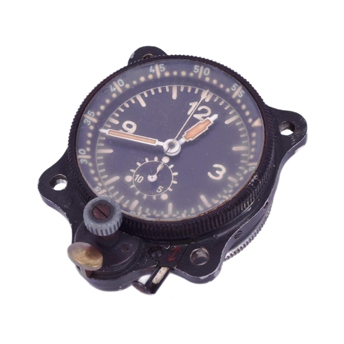 55 - A WWII Second World War Third Reich Luftwaffe aircraft cockpit clock by Junghans. Stamped to the mov... 