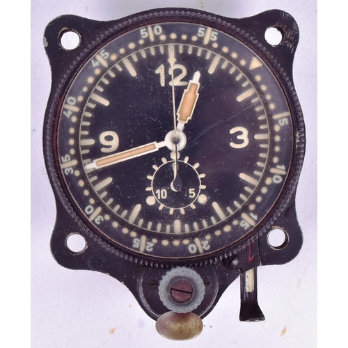 55 - A WWII Second World War Third Reich Luftwaffe aircraft cockpit clock by Junghans. Stamped to the mov... 