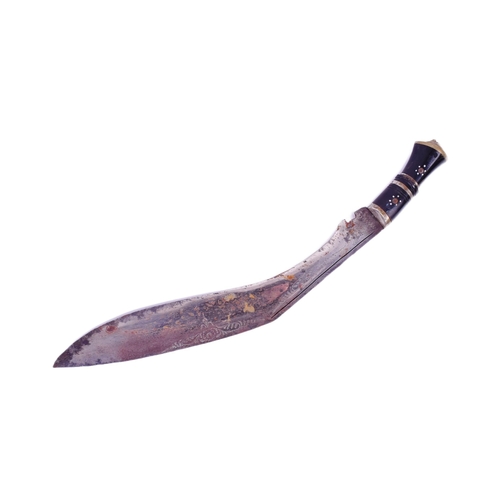 71 - A large mid 20th Century Indian Kukri knife. Brass capped pommel with lions head, horn grip with bra... 