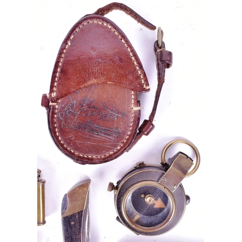 81 - A collection of assorted Militaria comprising; WWI First World War British compass with 1917 dated l... 