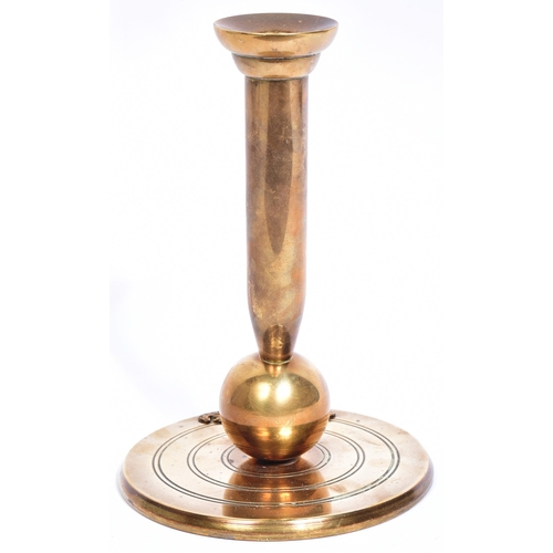 91 - An interesting brass fireside fire poker attributed to the Royal Artillery. Brass circular base with... 