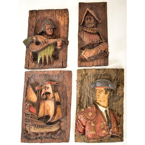 105 - Vanguard Studios Incorporated - A set of four 20th century 1960s American composition carvings / wal... 