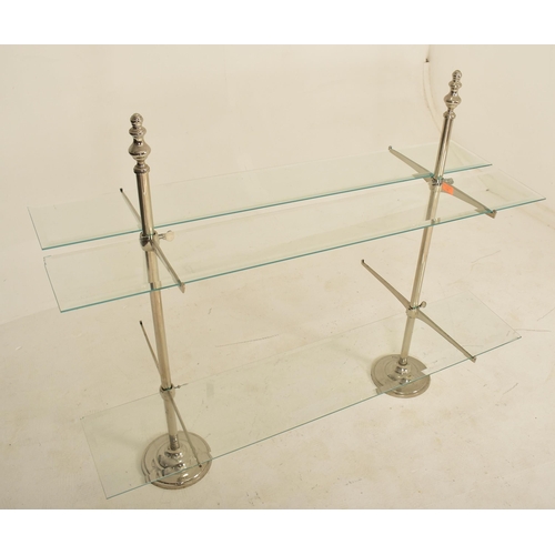 108 - A vintage 20th century Art Deco shop display stand / shelving unit. The display having two chrome up... 