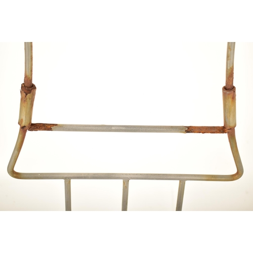 113 - A vintage mid 20th century shop display / valet mannequin stand. The standing of tubular metal const... 
