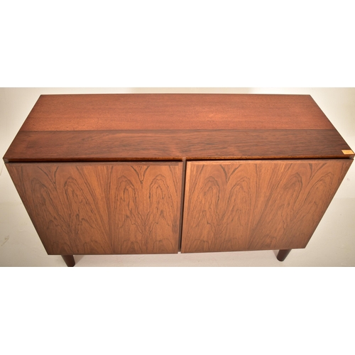 117 - Omann Jun - A retro 20th century Danish designer afromosia teak wood cupboard. The cupboard having t... 