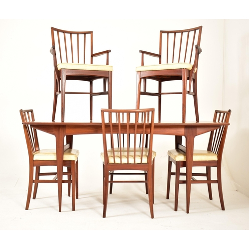 129 - Youngers - A retro 20th century 1970s British design teak dining table and six chairs (two carvers).... 