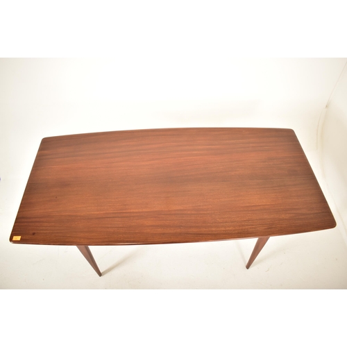 129 - Youngers - A retro 20th century 1970s British design teak dining table and six chairs (two carvers).... 