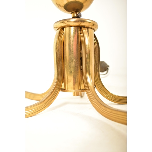 136 - A retro 20th century designer five branch hanging chandelier. The chandelier of brass construction h... 