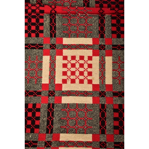 14 - A vintage 20th century hand made woollen traditional Welsh blanket. Red, cream, black and grey groun... 