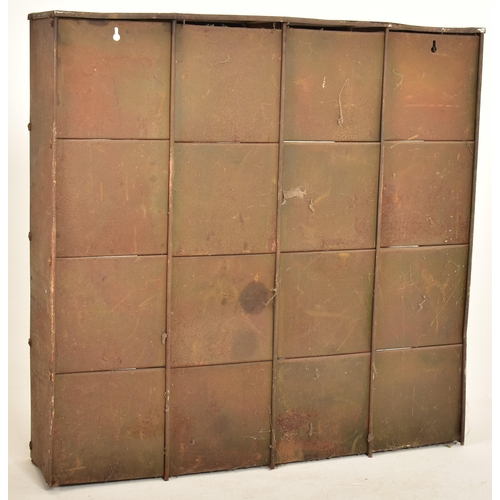 142 - A vintage 20th century factory industrial wall mounted / free standing pigeon holes metal cabinet. T... 