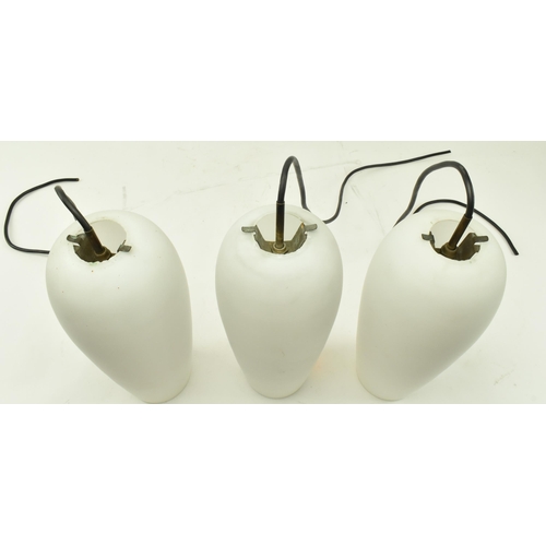 143 - A set of three vintage mid 20th century milk glass skittle / snooker ceiling pendant lights. Each ha... 