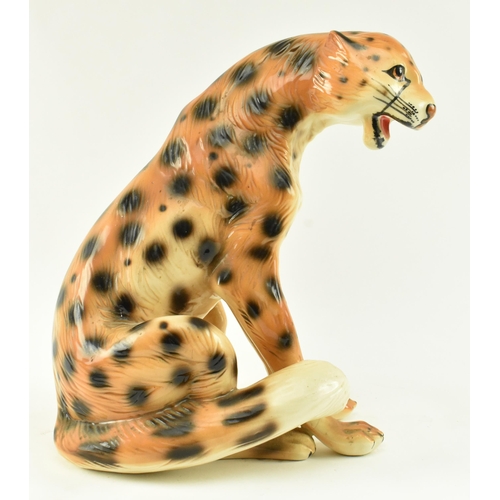151 - A retro 20th century Italian majolica ceramic floor standing leopard cat. The leopard with painted f... 