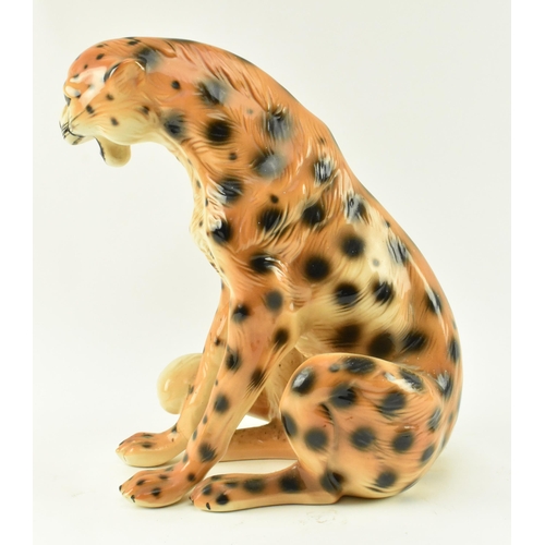 151 - A retro 20th century Italian majolica ceramic floor standing leopard cat. The leopard with painted f... 