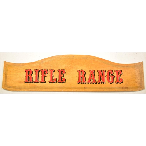 156 - Rifle Range - A 20th century fairground / funfair amusement park painted sign pediment. Shaped form ... 