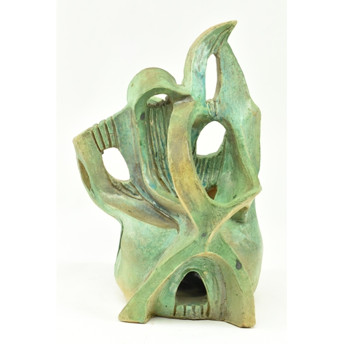 161 - A vintage 20th century studio art pottery 3D sculpture. The abstract sculpture of freeform work fini... 